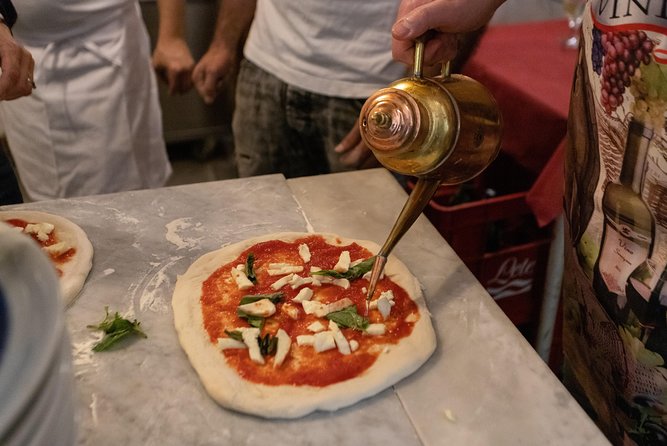Authentic Pizza Making Class in Naples with Appetizers and Drink - Appetizers first: fior di latte and cherry tomato bruschetta