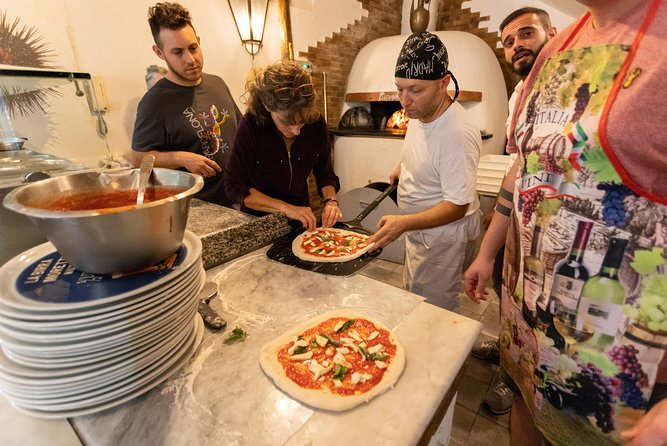 Authentic Pizza Making Class in Naples with Appetizers and Drink - Dough tools, apron, and chef-led stretching (the real lesson)