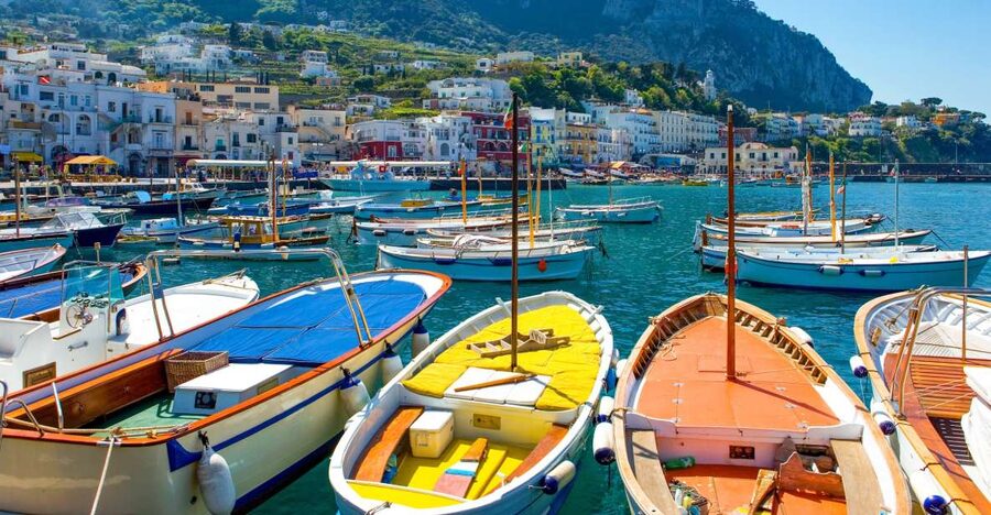 Capri: Boat and Island Tour - The shared gozzo boat ride: bays, caves, and close-up sea views