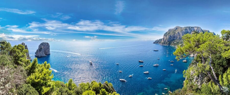Capri boat experience from Naples - The boat tour around Capri: Faraglioni and the sea highlights