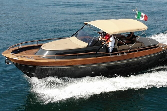 Capri Boat Tour from Naples – Small Group, Swim & Relax - Circling Capri by Sea: Caves, Natural Arch, and Faraglioni