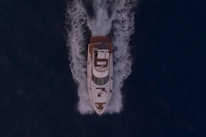 Capri Private tour in Azimut 43 with professional Chef - Sailing viewpoints before Capri: Vesuvius and the Sorrento coast from the water