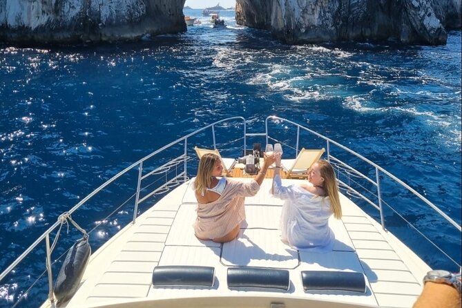 Capri Private tour in Azimut 43 with professional Chef - Capri in the spotlight: caves, coves, Blue Grotto area, and Faraglioni aperitif