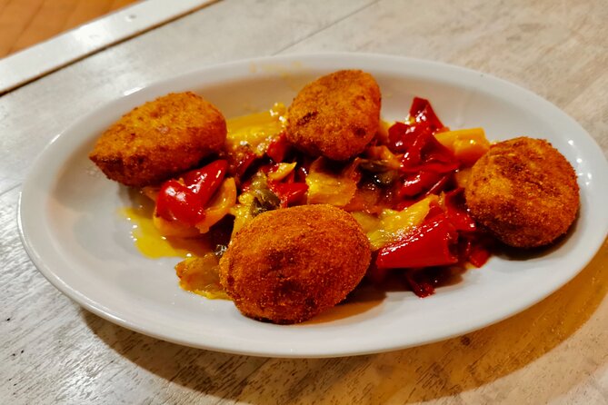 Evening Flavors of Naples: Private Food Tour and Wine Tasting - Entering Naples by way of Via dei Tribunali and the Greek Walls