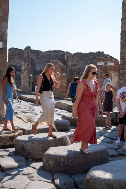 From Naples: Pompeii tour with ticket, guide, and transfer included - Graffiti, shops, and the Pompeii brothel: the honest side of city life