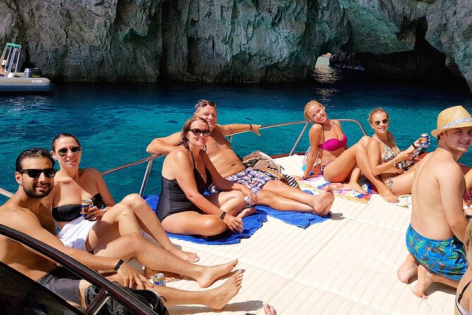 Full day Capri Island Small Group Boat Tour from Naples - Faraglioni: the Capri rocks you’ll recognize immediately
