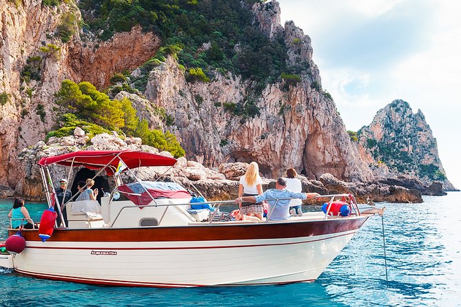 Full day Capri Island Small Group Boat Tour from Naples - Grotta Verde and Punta Carena: light effects, then a lighthouse headland