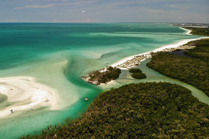 Guided Dolphin Eco Tour by Kayak & SUP - Fort Myers Beach, FL - Getting to the island: meeting point and why the timing matters