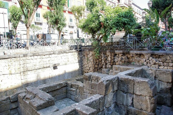 Legends of Naples: Superstitions, Saints and Secrets Walking Tour - Via dei Tribunali to Gesù Nuovo: Pulcinella luck, Banksy, and street-food energy