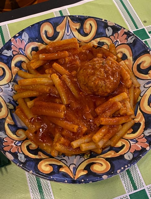 Naples: Authentic Family Home Lunch with Music Show & Spanish Quarters Tour - The big moment: lunch in a basso/vascio home