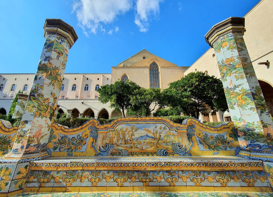 Naples: Church Of Santa Chiara Guided Tour - Cloister time: majolica decoration that changes the mood