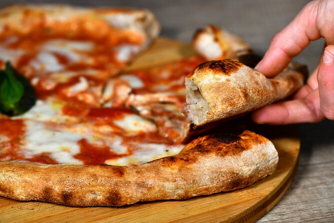 Naples: Pizza and Beyond Food Tour by Do Eat Better - Stop 3 at Piazzetta Nilo: pizza fritta and the handheld Naples attitude