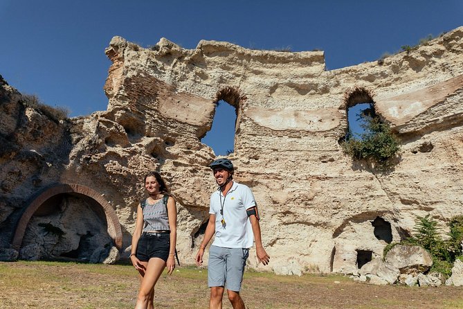 Naples Scenic E-Bike Ride to a Local Vineyard with Meal - Roman ruins near Pozzuoli: Macellum (Temple of Serapis) to Flavian Amphitheater