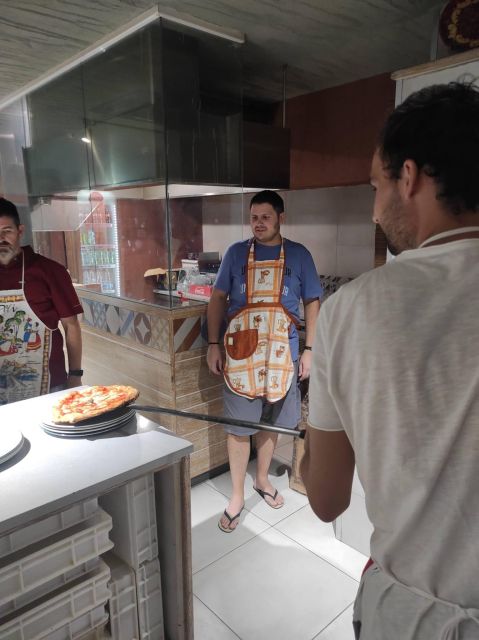 Naples: Small Group Pizza Making with Drink Included - Cooking Moment: The Oven Finish and the Pizzaiolo Touch