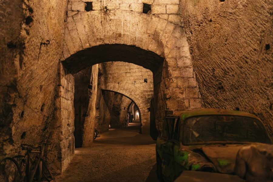 Naples: The Bourbon Tunnel Guided Tour with Entrance Ticket - Naples Underworld: Bourbon Tunnel as a 4-Century Walk