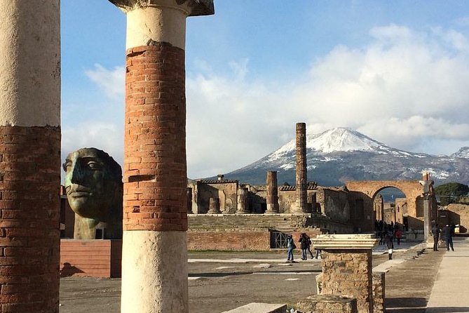Pompeii Tour & Admission included in a Small Group - Roman baths, thermopolia, and shops where daily life actually happened