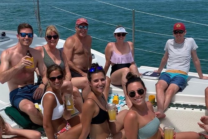 Sightseeing and Sunset Catamaran Sailing Excursion - Onboard Comfort: Cupholders, Safety, and First-Time Sailor Ease