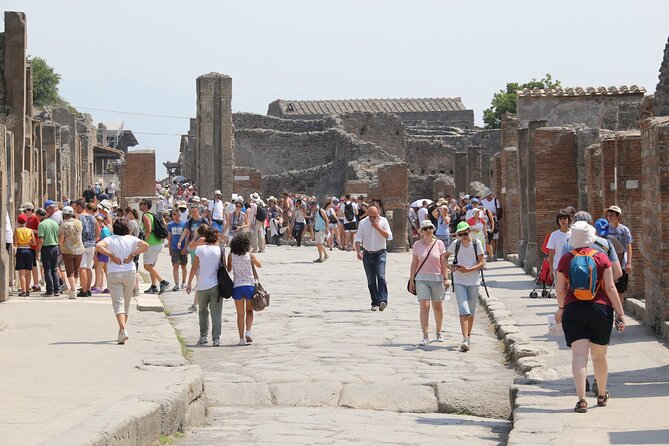 Small group tour to Pompeii, Sorrento and Positano - Positano by the water: shops, beach views, and a panoramic viewpoint